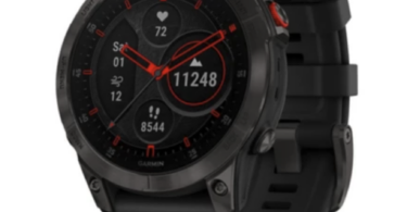 a black watch with a red and black face